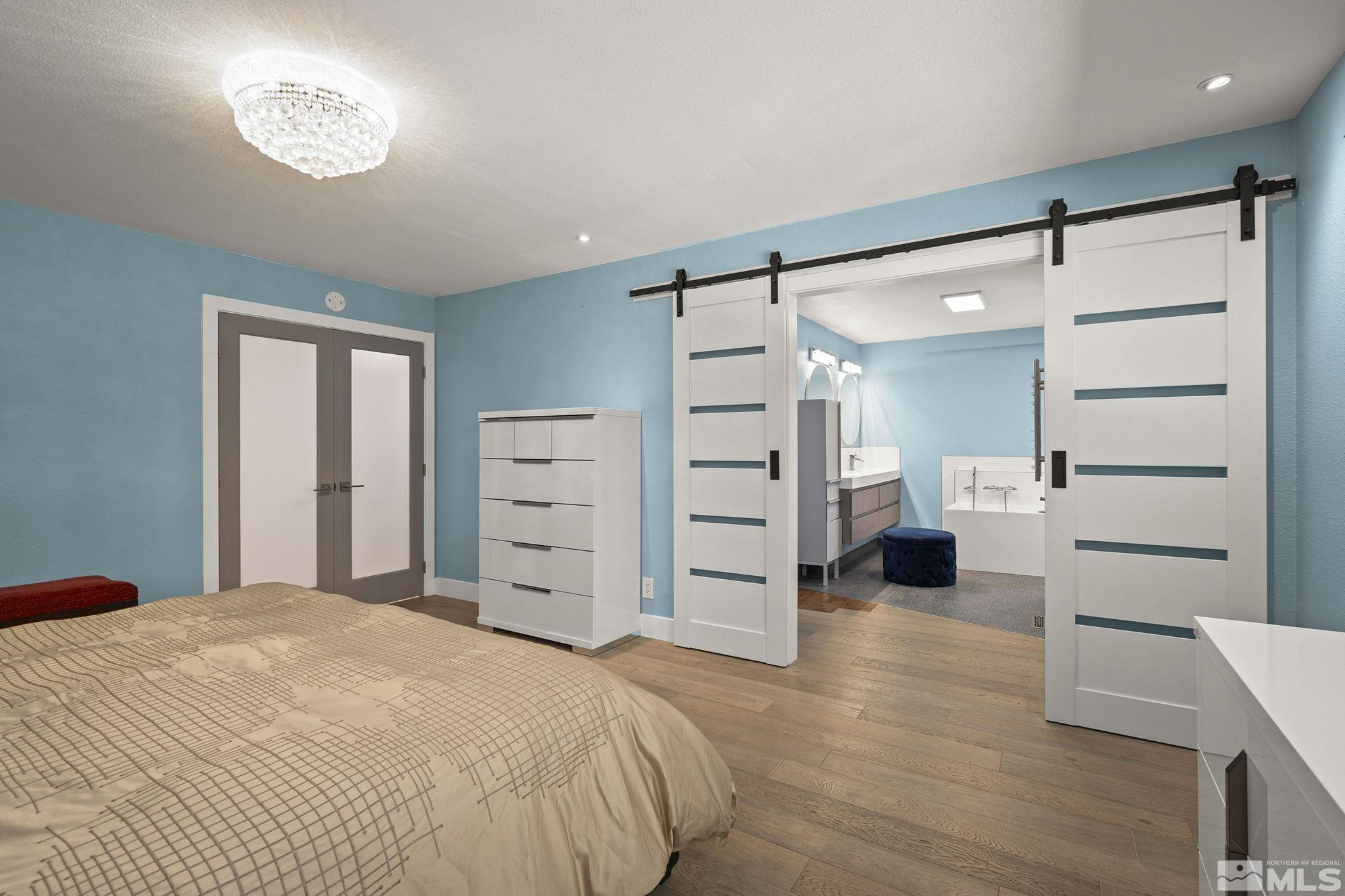 920 Pinebrook Road Reno, NV 89509 - Photo 26 of 40 a bedroom with a bed and a view of closet