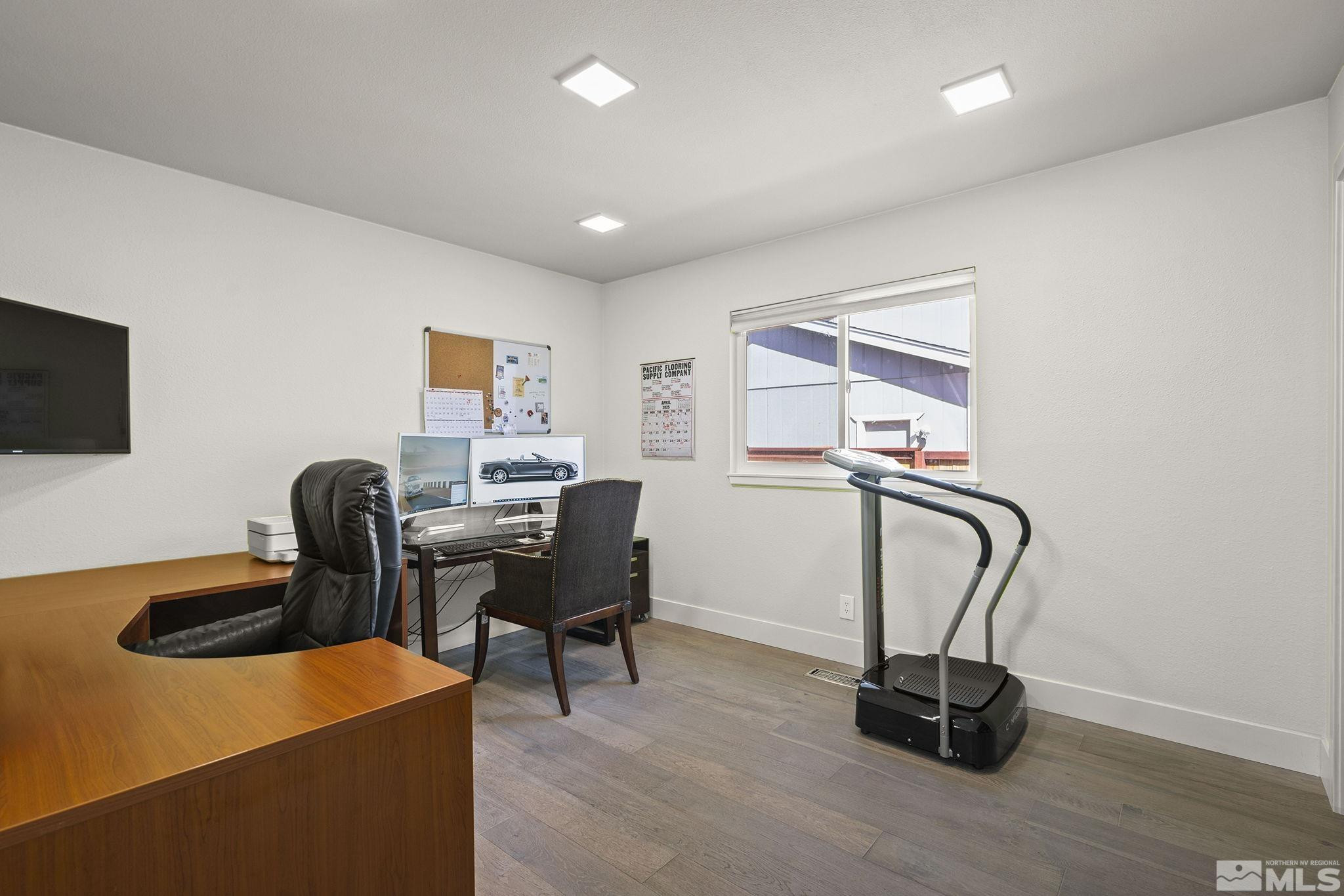 920 Pinebrook Road Reno, NV 89509 - Photo 34 of 40 a work room with furniture and a flat screen tv