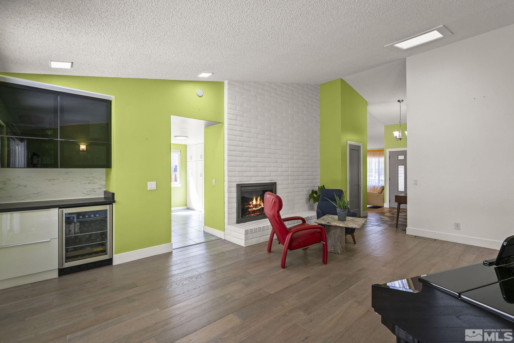 920 Pinebrook Road Reno, NV 89509 - Photo 6 of 40 a living room with furniture and a fireplace