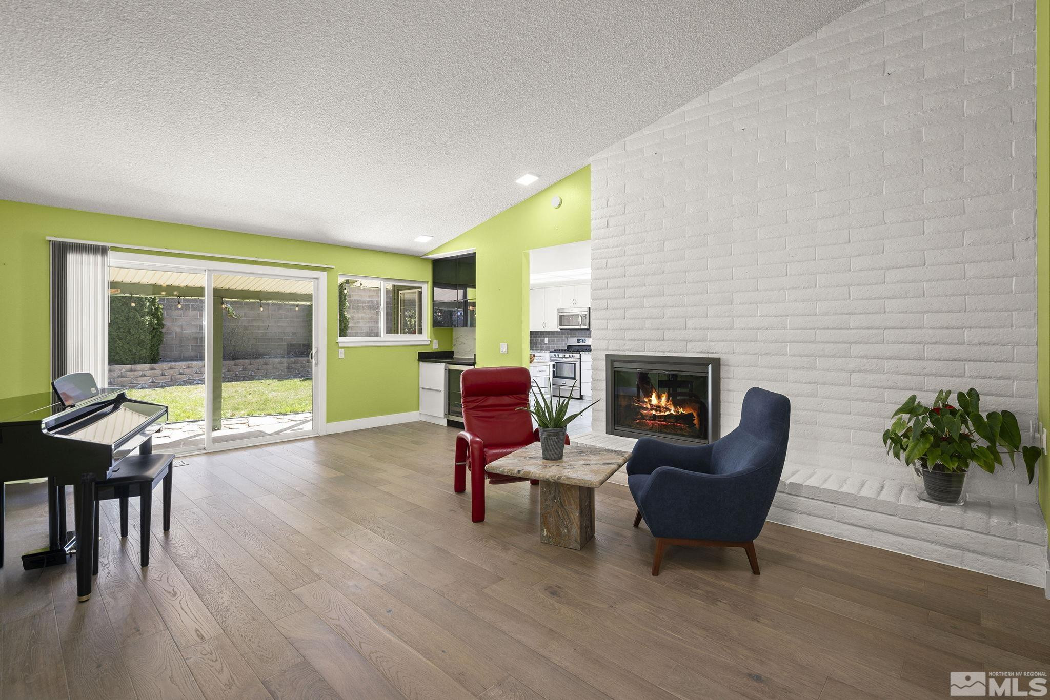 920 Pinebrook Road Reno, NV 89509 - Photo 8 of 40 a living room with furniture and a fireplace