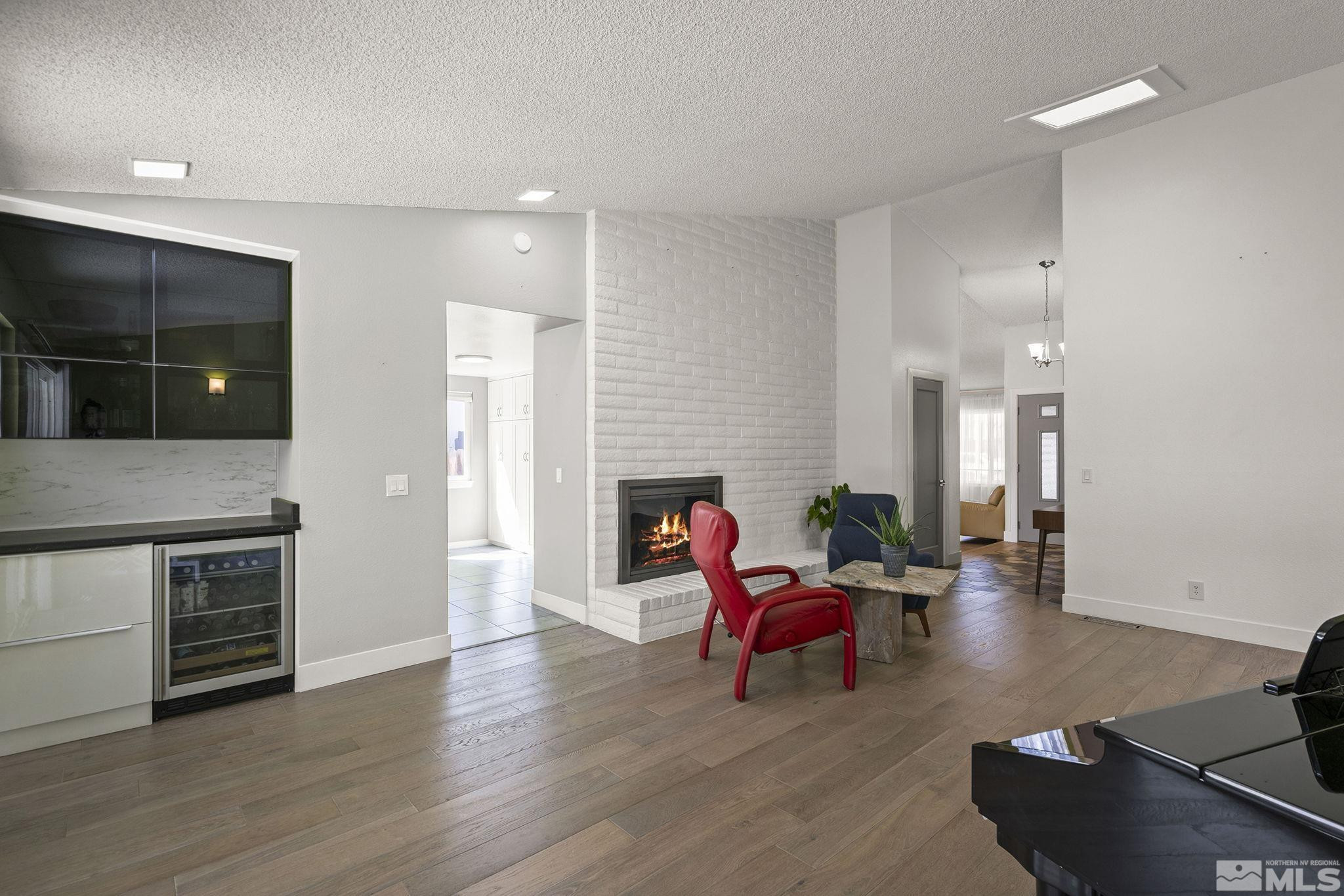 920 Pinebrook Road Reno, NV 89509 - Photo 9 of 40 a living room with furniture and a fireplace