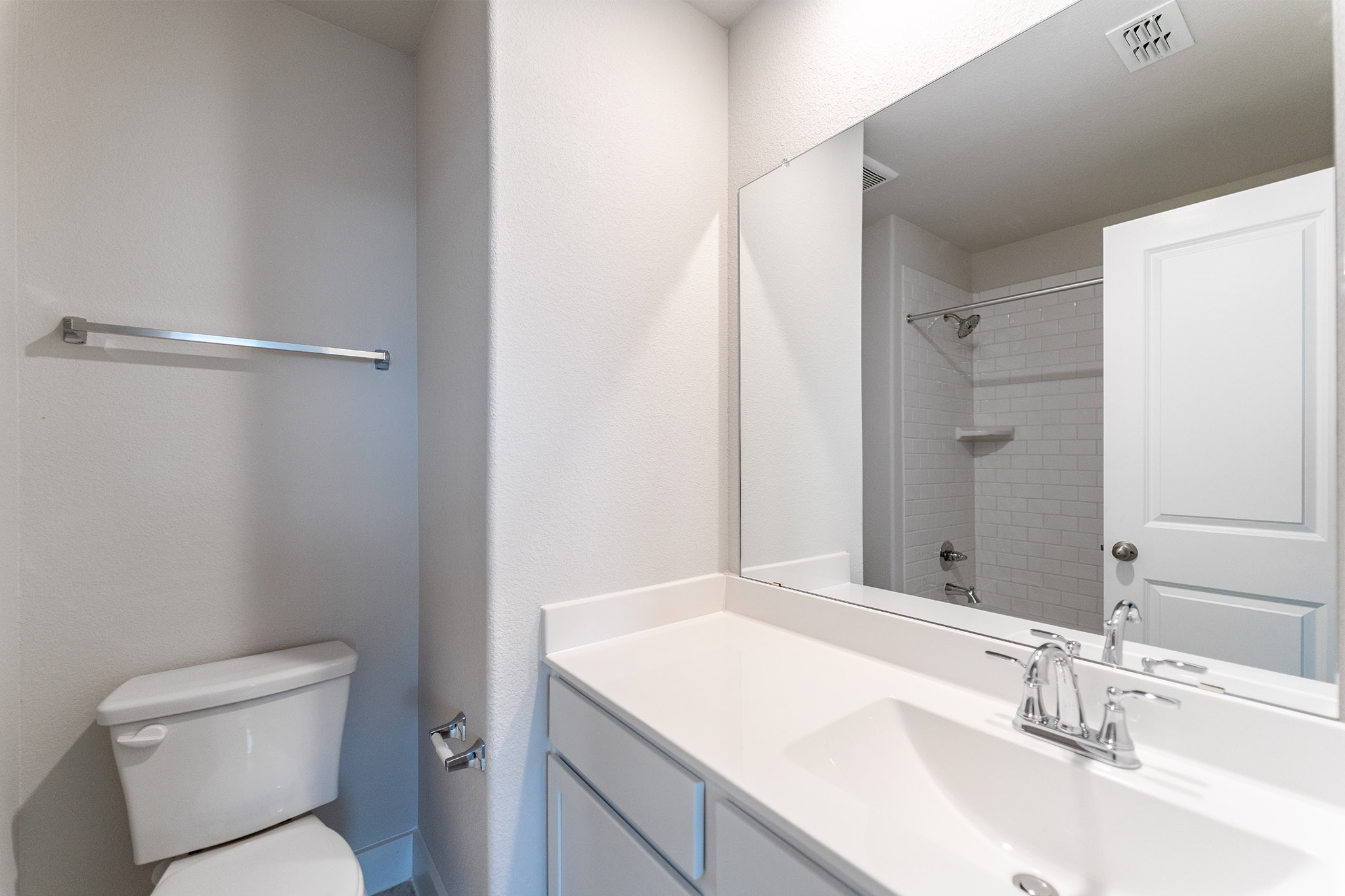 871 Cherrystone Loop Buda, TX 78610 - Photo 13 of 20 a bathroom with a sink toilet and shower