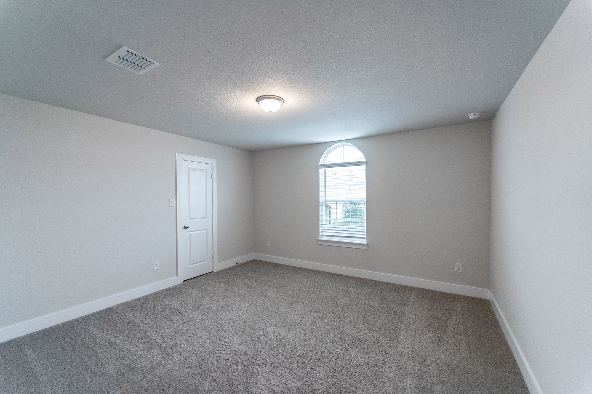 871 Cherrystone Loop Buda, TX 78610 - Photo 14 of 20 a view of an empty room with a window