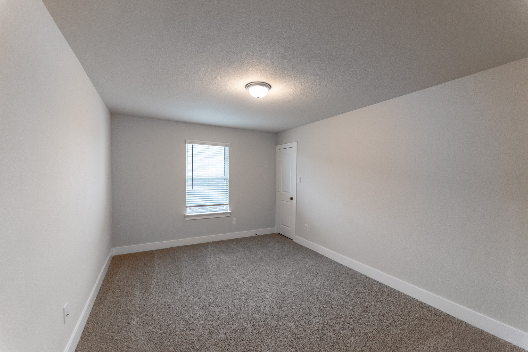 871 Cherrystone Loop Buda, TX 78610 - Photo 17 of 20 an empty room with a window