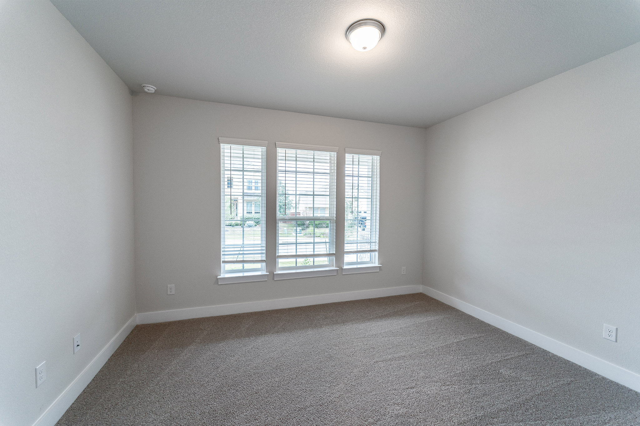 871 Cherrystone Loop Buda, TX 78610 - Photo 19 of 20 an empty room with a window