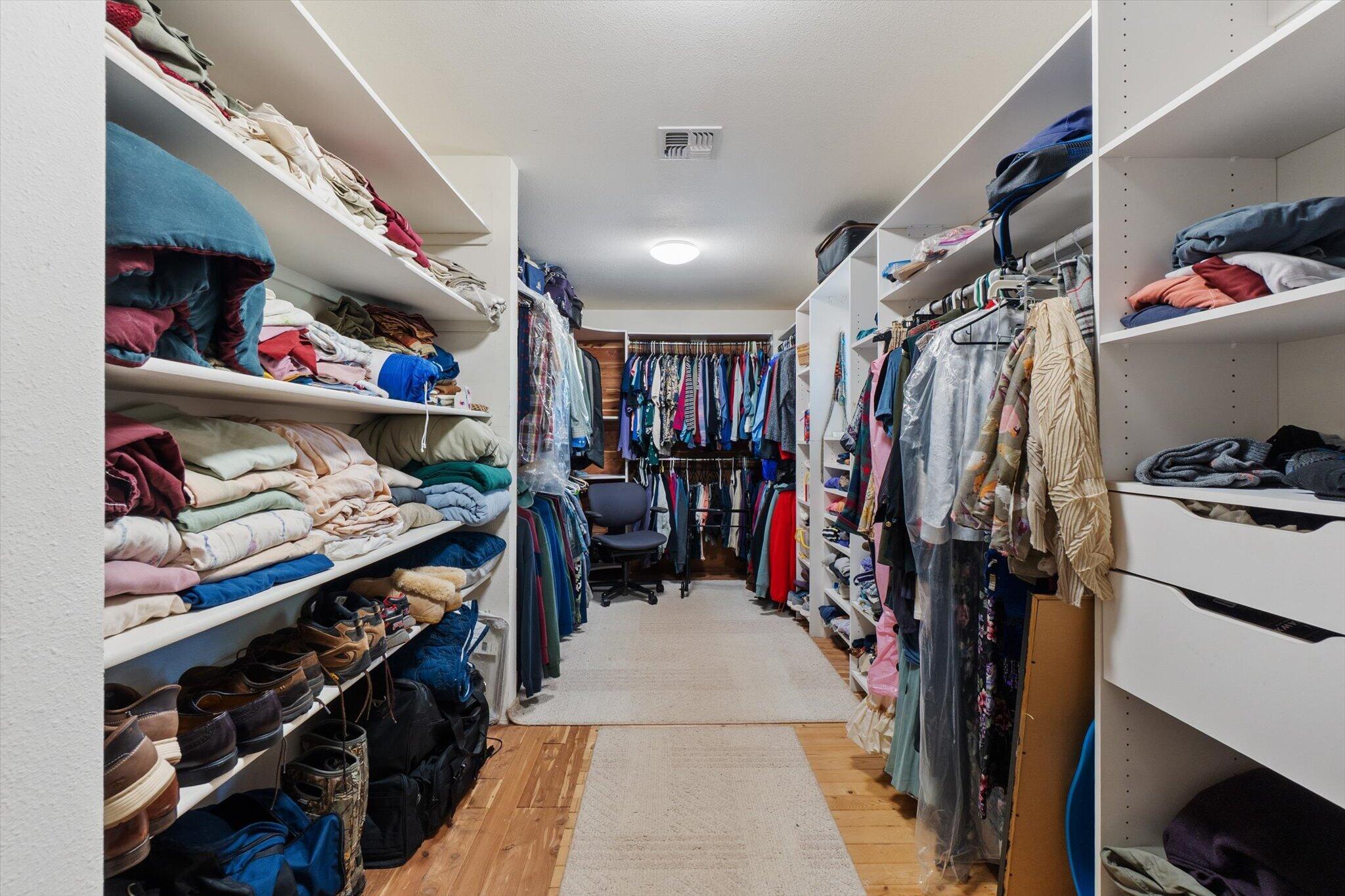 26997 Lookout Mountain Road Oak Run, CA 96069 - Photo 37 of 92 a view of walk in closet with clothes and shoes