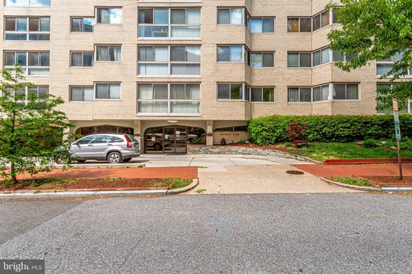 a view of a street with buildings