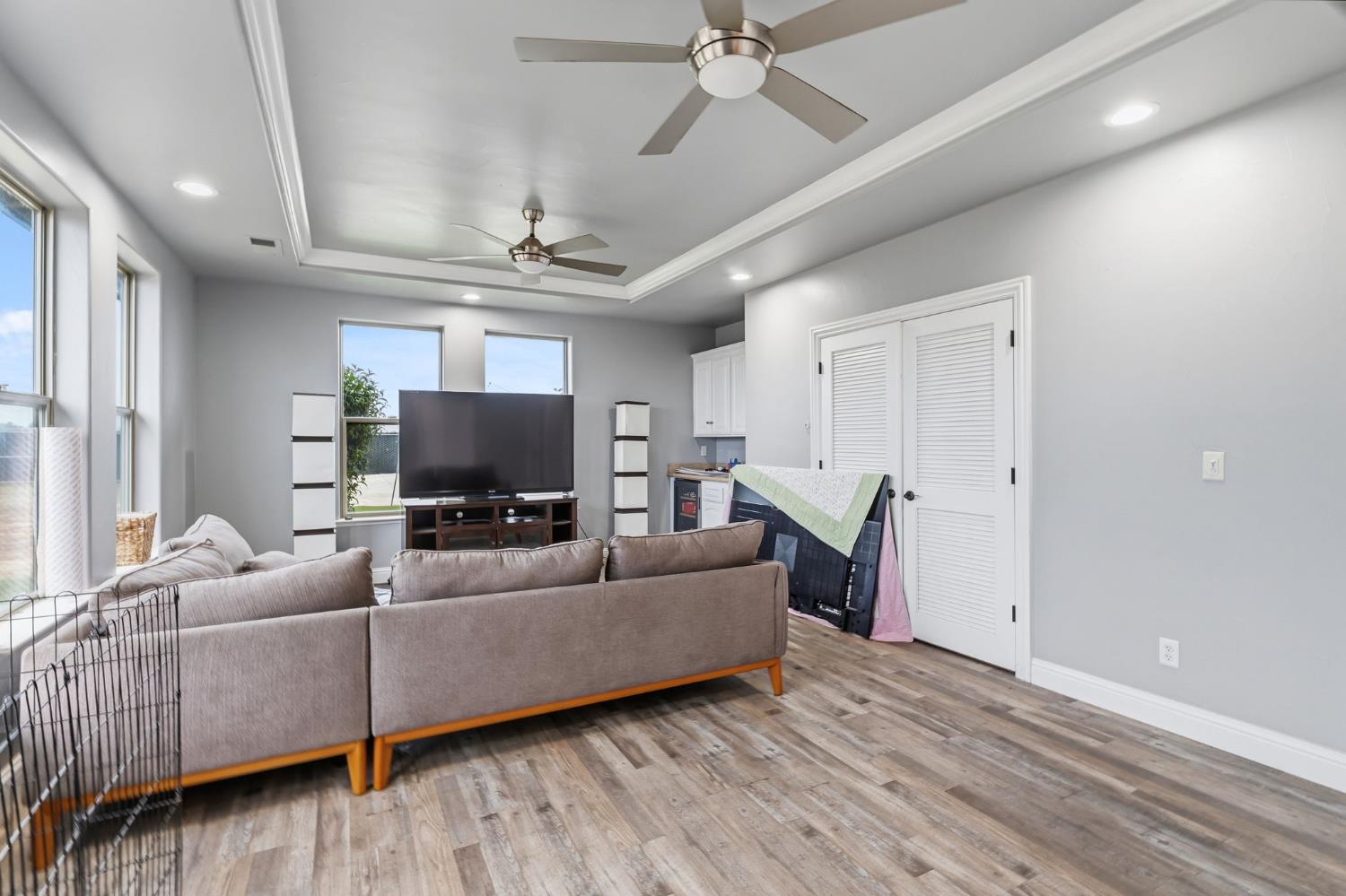 17703 El Camino Road Madera, CA 93636 - Photo 27 of 64 a living room with furniture and a flat screen tv
