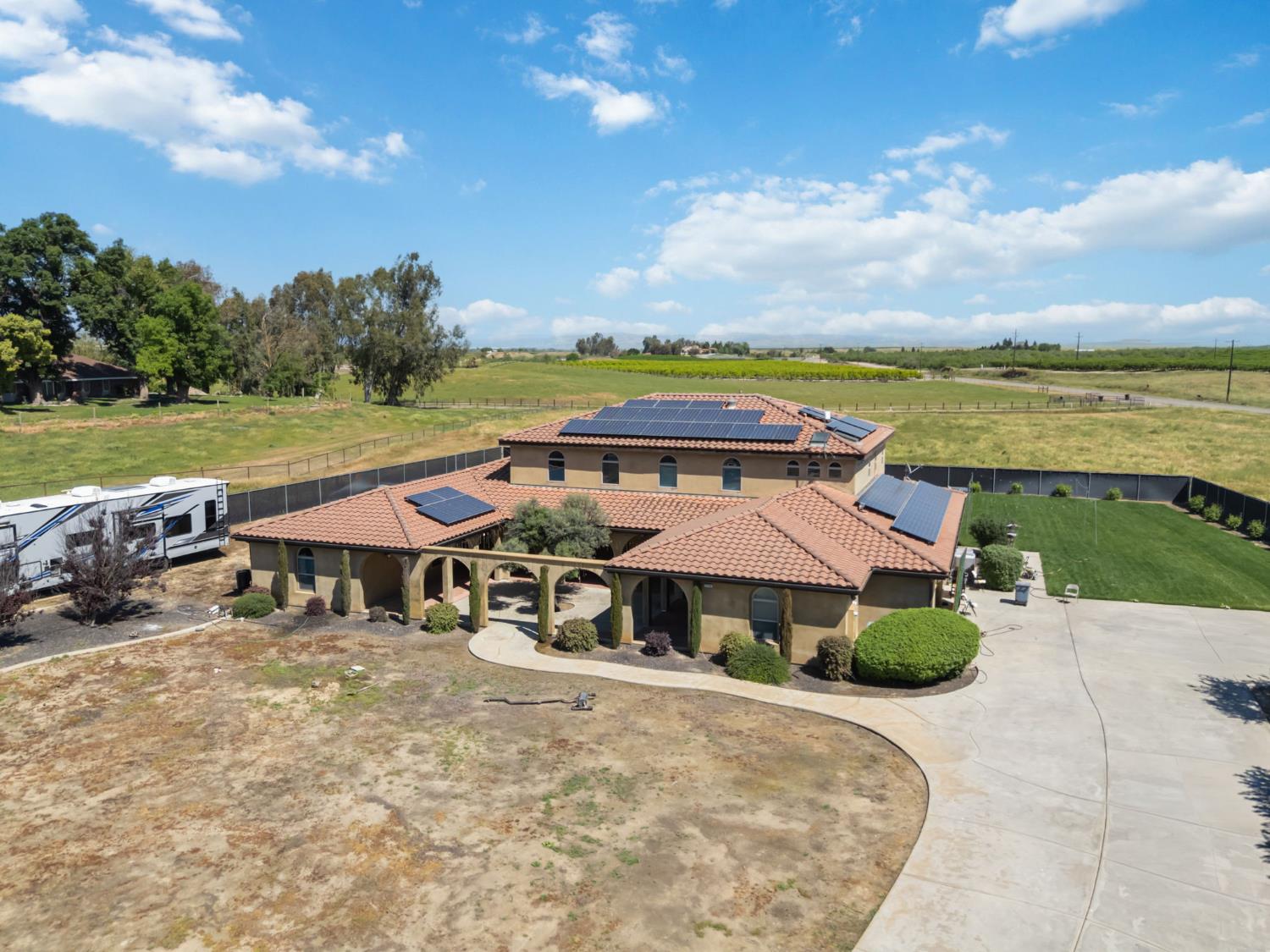 17703 El Camino Road Madera, CA 93636 - Photo 50 of 64 an aerial view of a house with garden space and ocean view