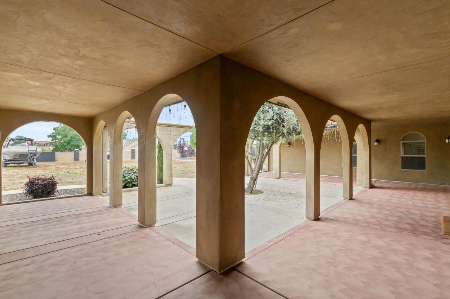 17703 El Camino Road Madera, CA 93636 - Photo 10 of 64 a view of entryway with a garden
