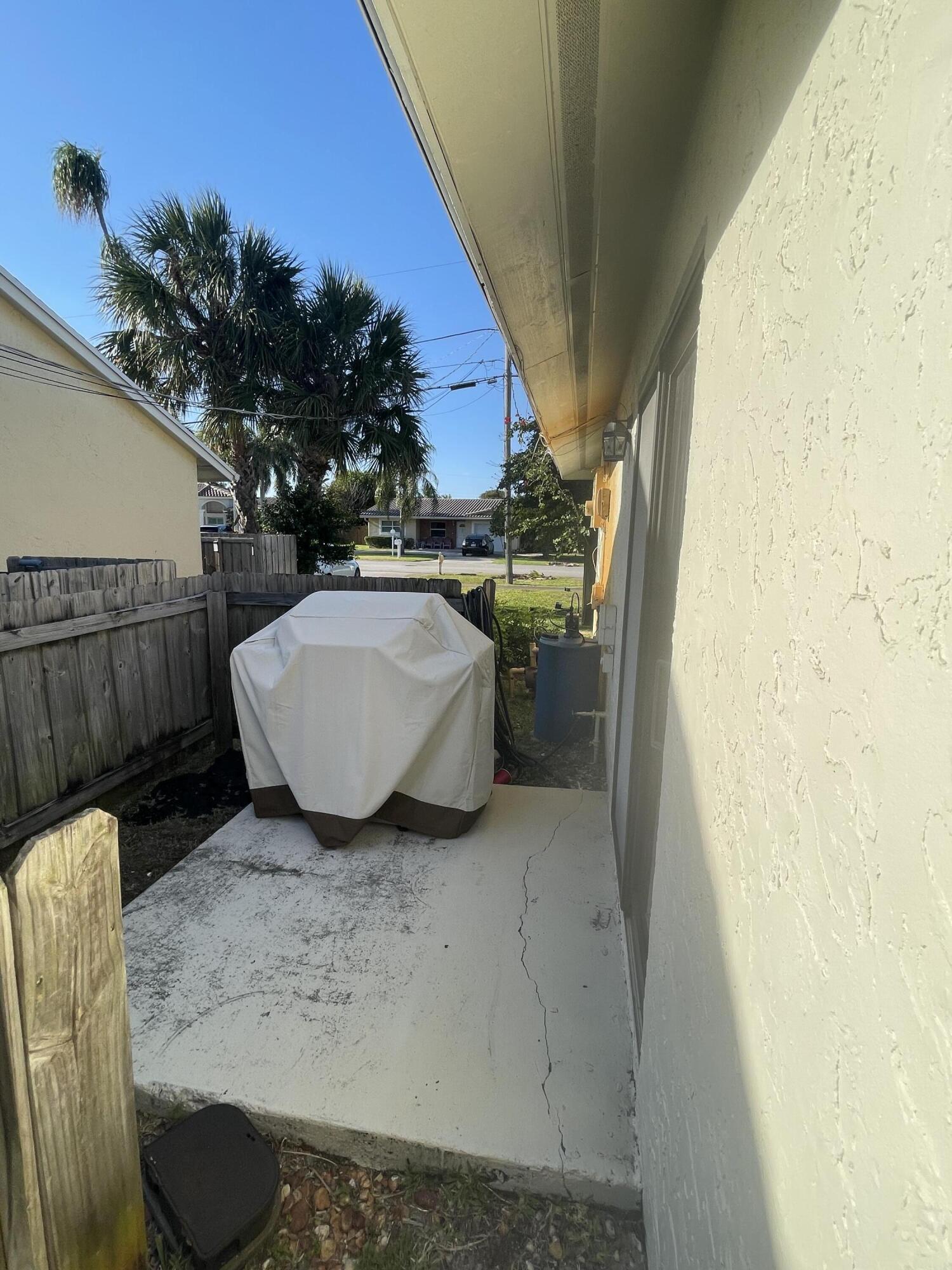468 Northeast 42nd Street Boca Raton, FL 33431 - Photo 34 of 37 Exterior side patio