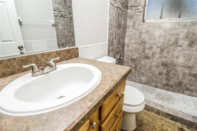 a bathroom with a sink and a toilet