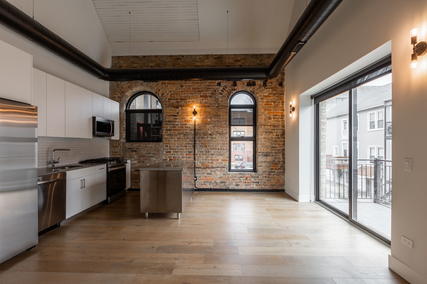 Undisclosed Address Chicago, IL 60647 - Photo 2 of 17 a view of a kitchen with a sink and a large window
