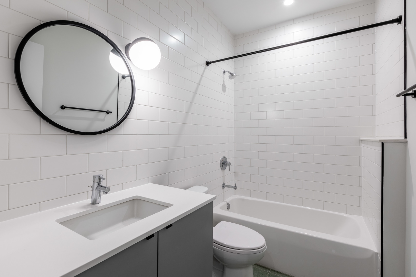 Undisclosed Address Chicago, IL 60647 - Photo 10 of 17 a bathroom with a sink toilet and shower