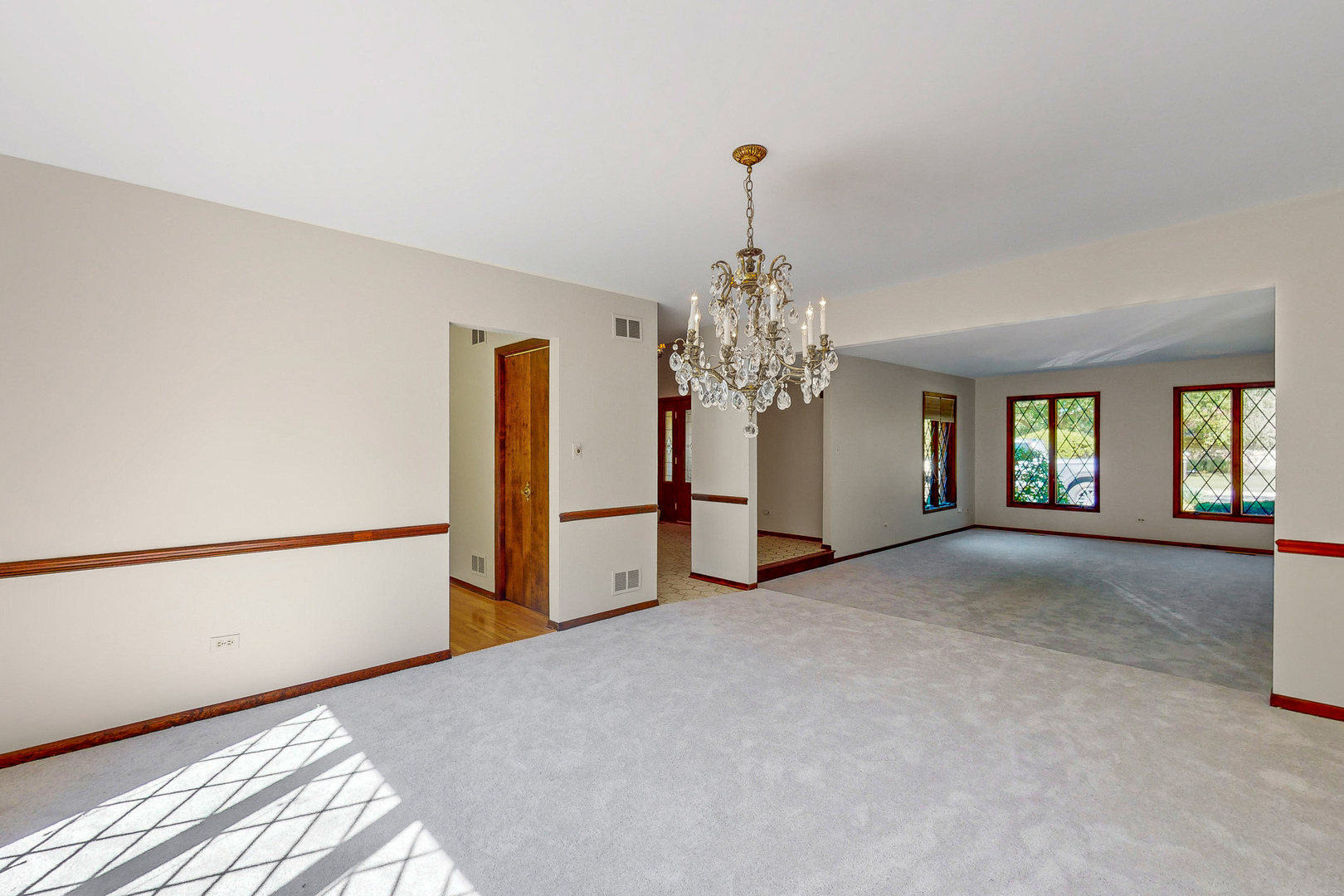 309 Hambletonian Drive Oak Brook, IL 60523 - Photo 19 of 39 a view of a livingroom with a chandelier