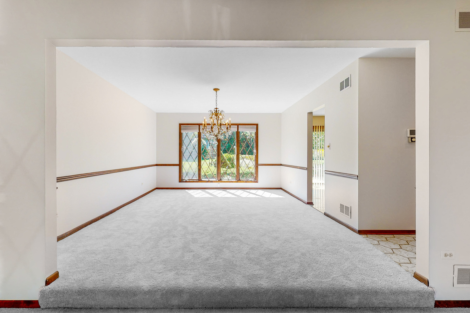 309 Hambletonian Drive Oak Brook, IL 60523 - Photo 21 of 39 a view of an empty room with a window
