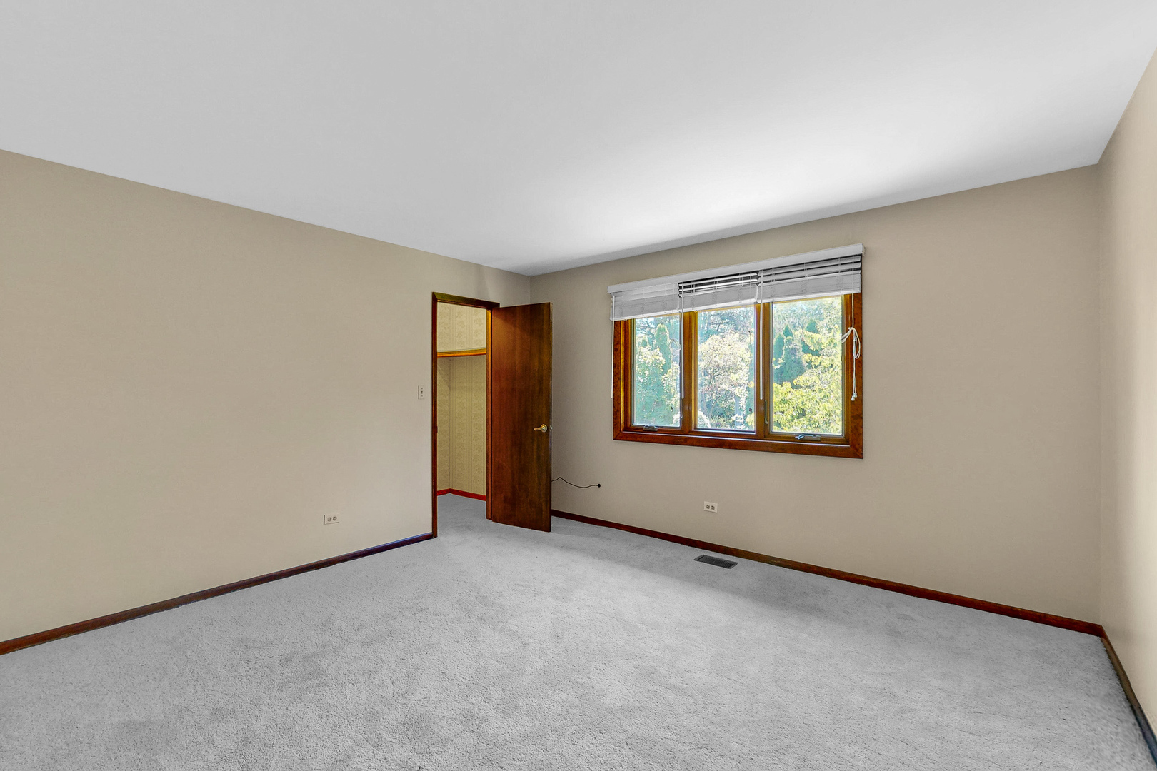 309 Hambletonian Drive Oak Brook, IL 60523 - Photo 29 of 39 a view of an empty room with a window