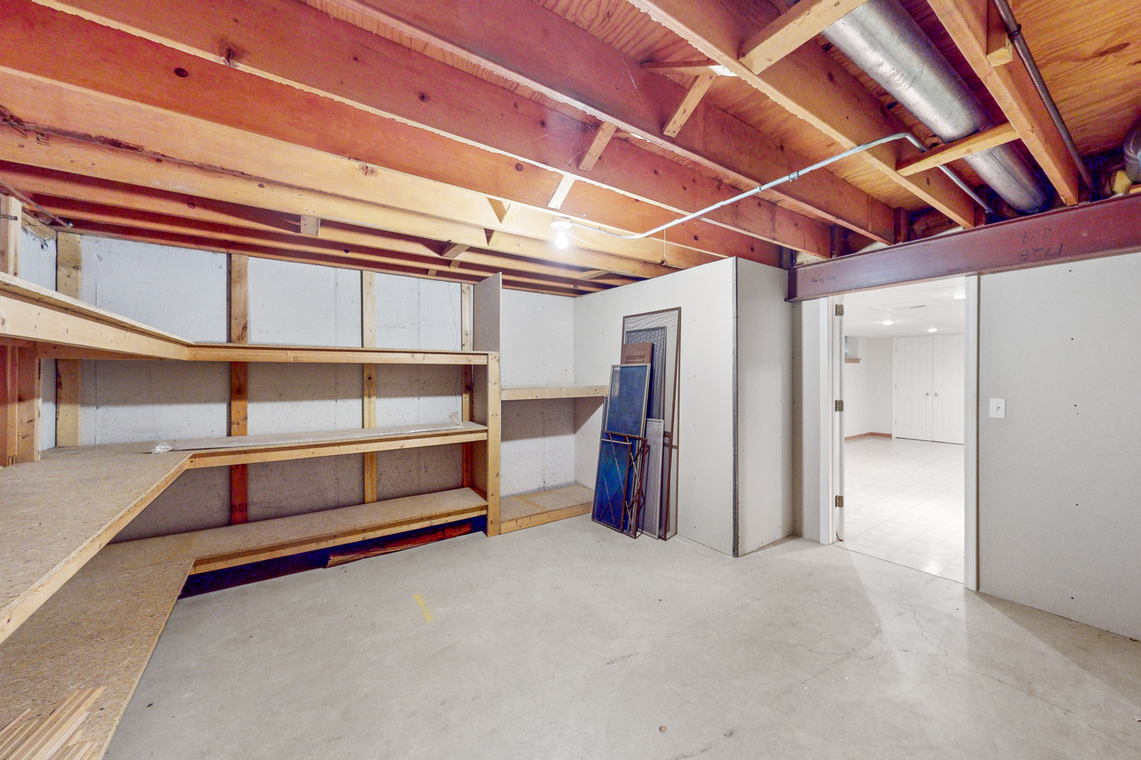 309 Hambletonian Drive Oak Brook, IL 60523 - Photo 36 of 39 a view of an empty room with a staircase