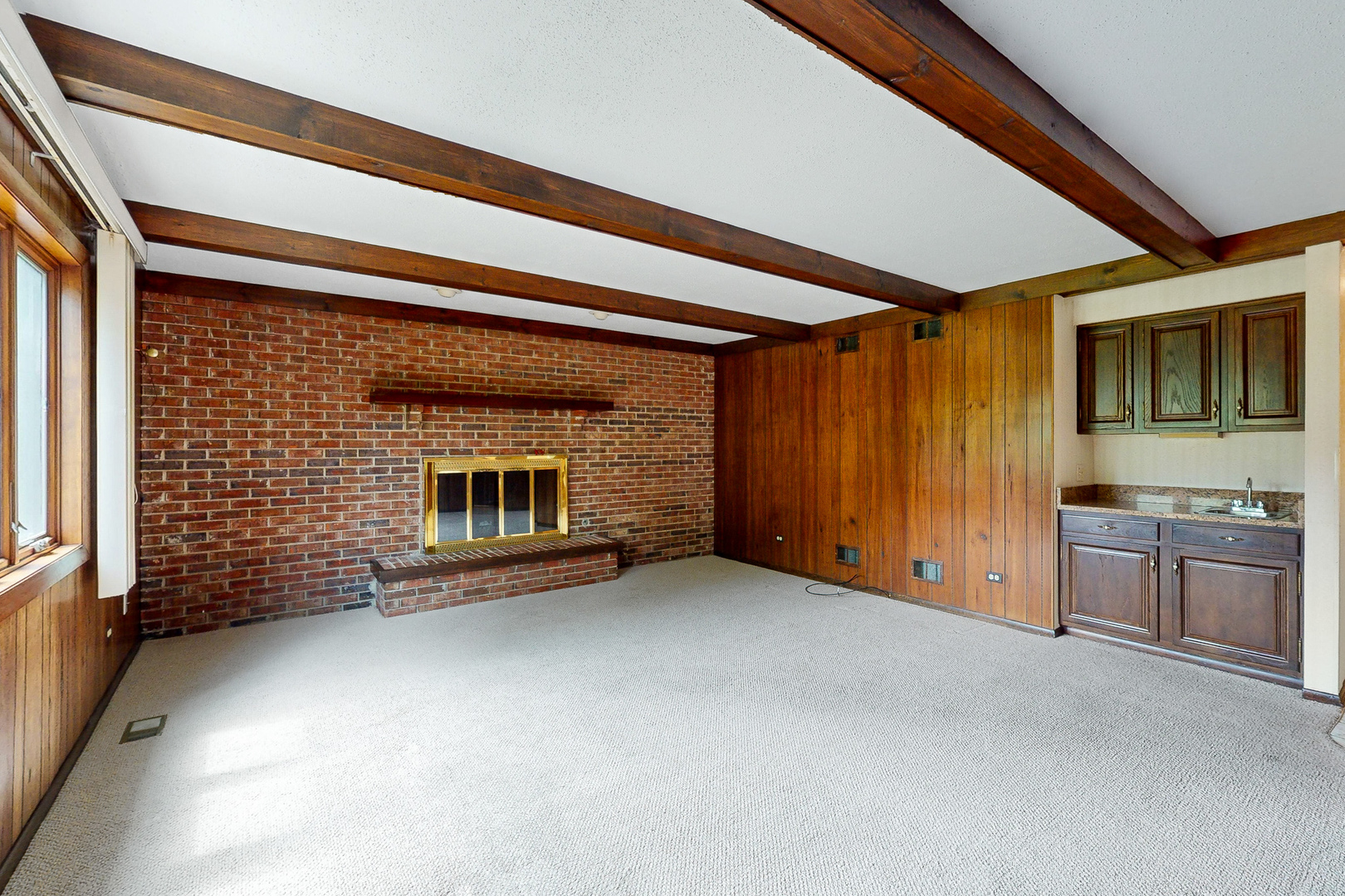 309 Hambletonian Drive Oak Brook, IL 60523 - Photo 10 of 39 a view of an empty room with a fireplace