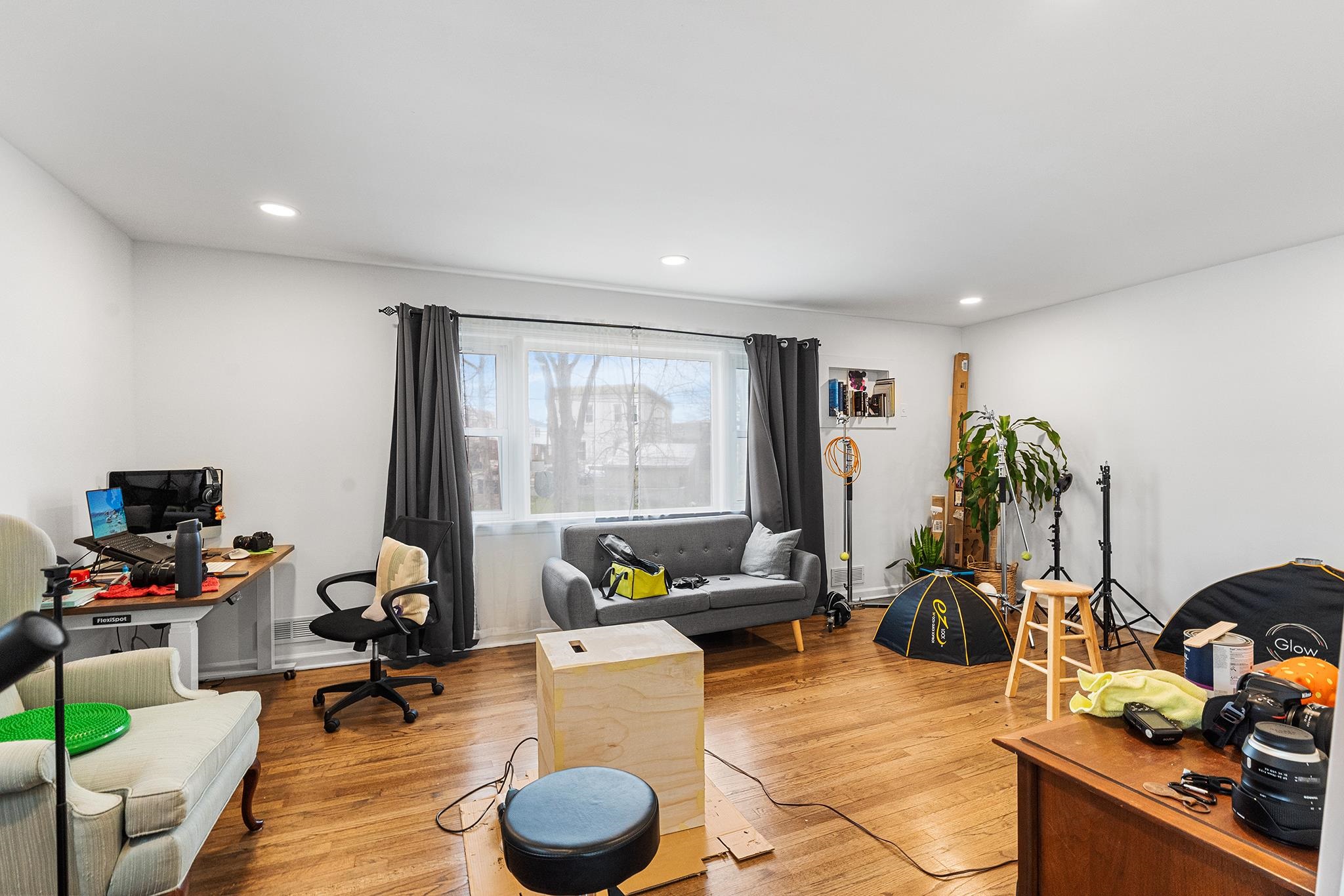 6 Mutillod Lane Secaucus, NJ 07094 - Photo 23 of 41 a living room with furniture a window and a flat screen tv