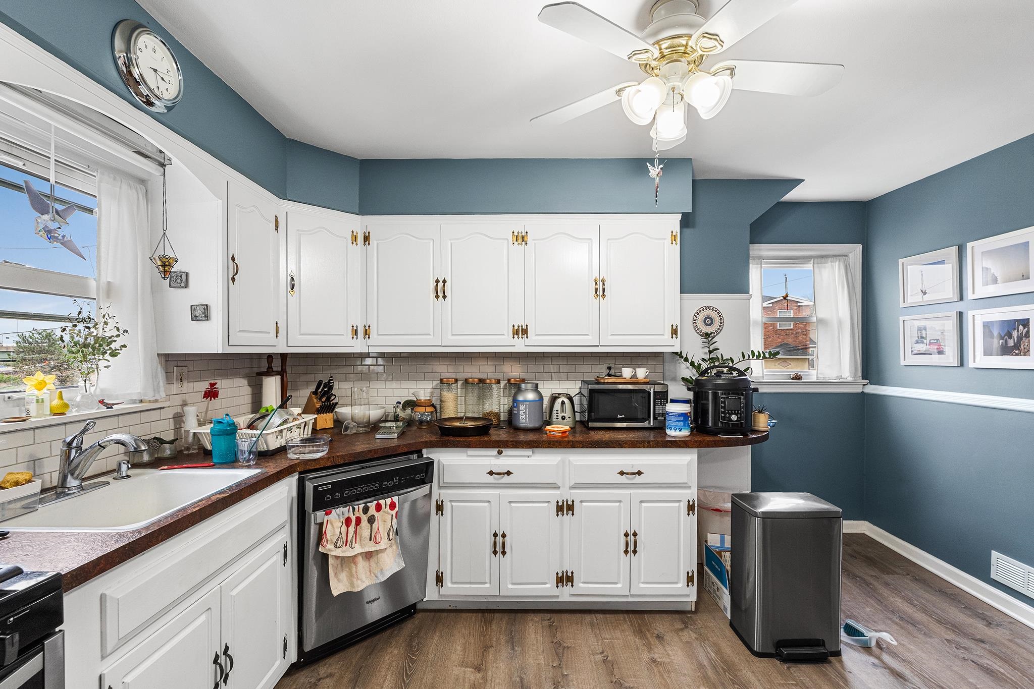 6 Mutillod Lane Secaucus, NJ 07094 - Photo 24 of 41 a kitchen with granite countertop a sink cabinets stainless steel appliances and a window