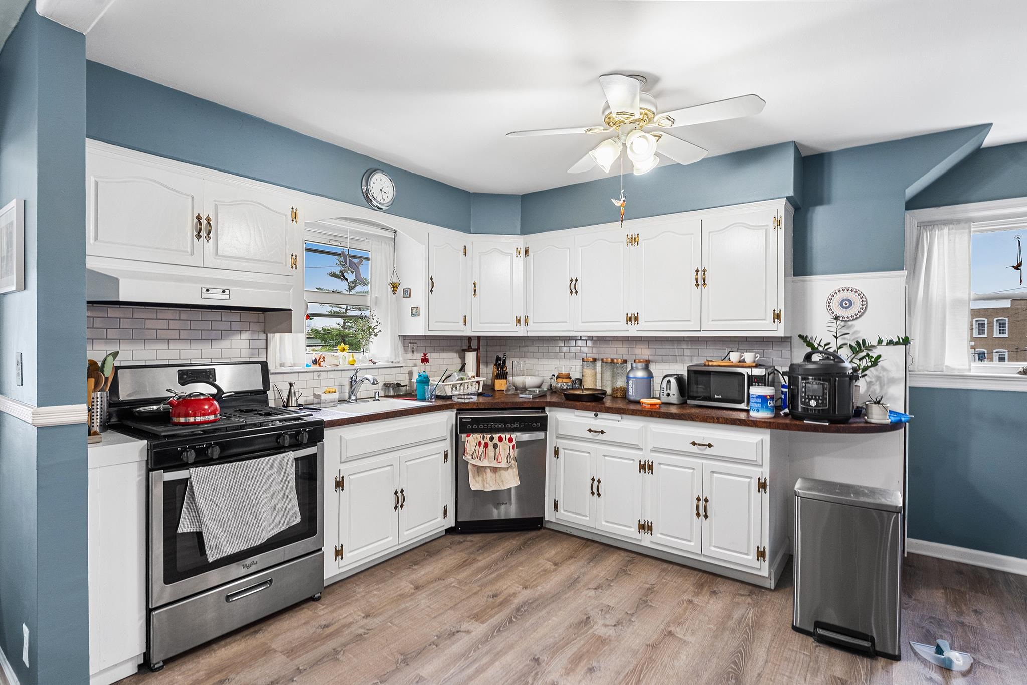 6 Mutillod Lane Secaucus, NJ 07094 - Photo 26 of 41 a kitchen with granite countertop white cabinets and white appliances