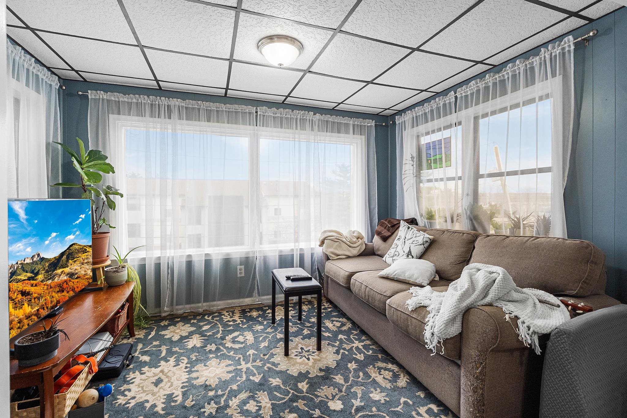 6 Mutillod Lane Secaucus, NJ 07094 - Photo 29 of 41 a living room with furniture and a window