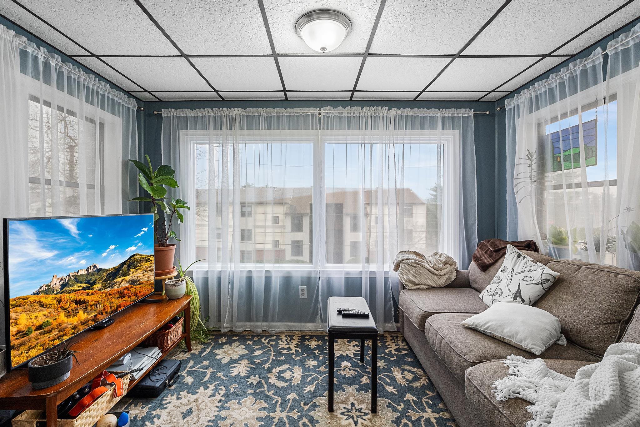 6 Mutillod Lane Secaucus, NJ 07094 - Photo 30 of 41 a bedroom with furniture and a large window