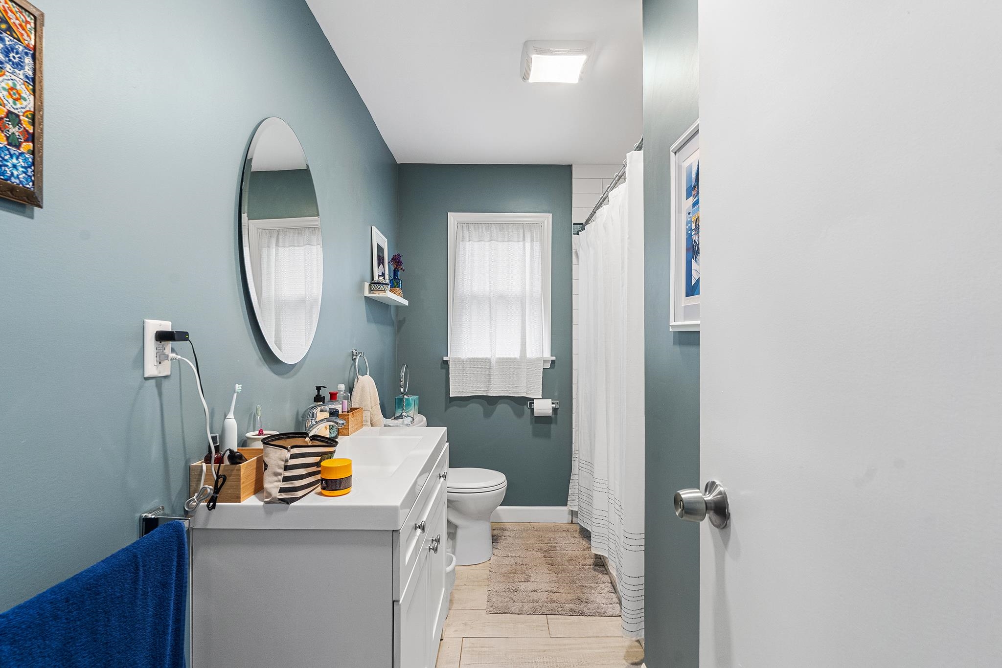 6 Mutillod Lane Secaucus, NJ 07094 - Photo 35 of 41 a bathroom with a toilet sink vanity granite and a mirror