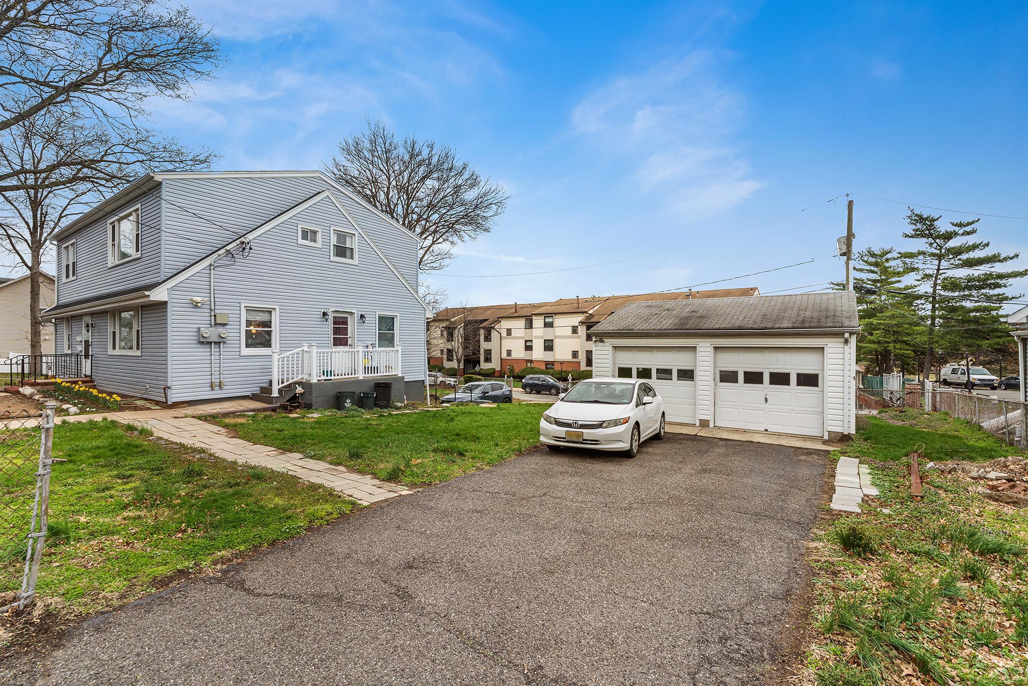 6 Mutillod Lane Secaucus, NJ 07094 - Photo 39 of 41 a view of a car park in front of house