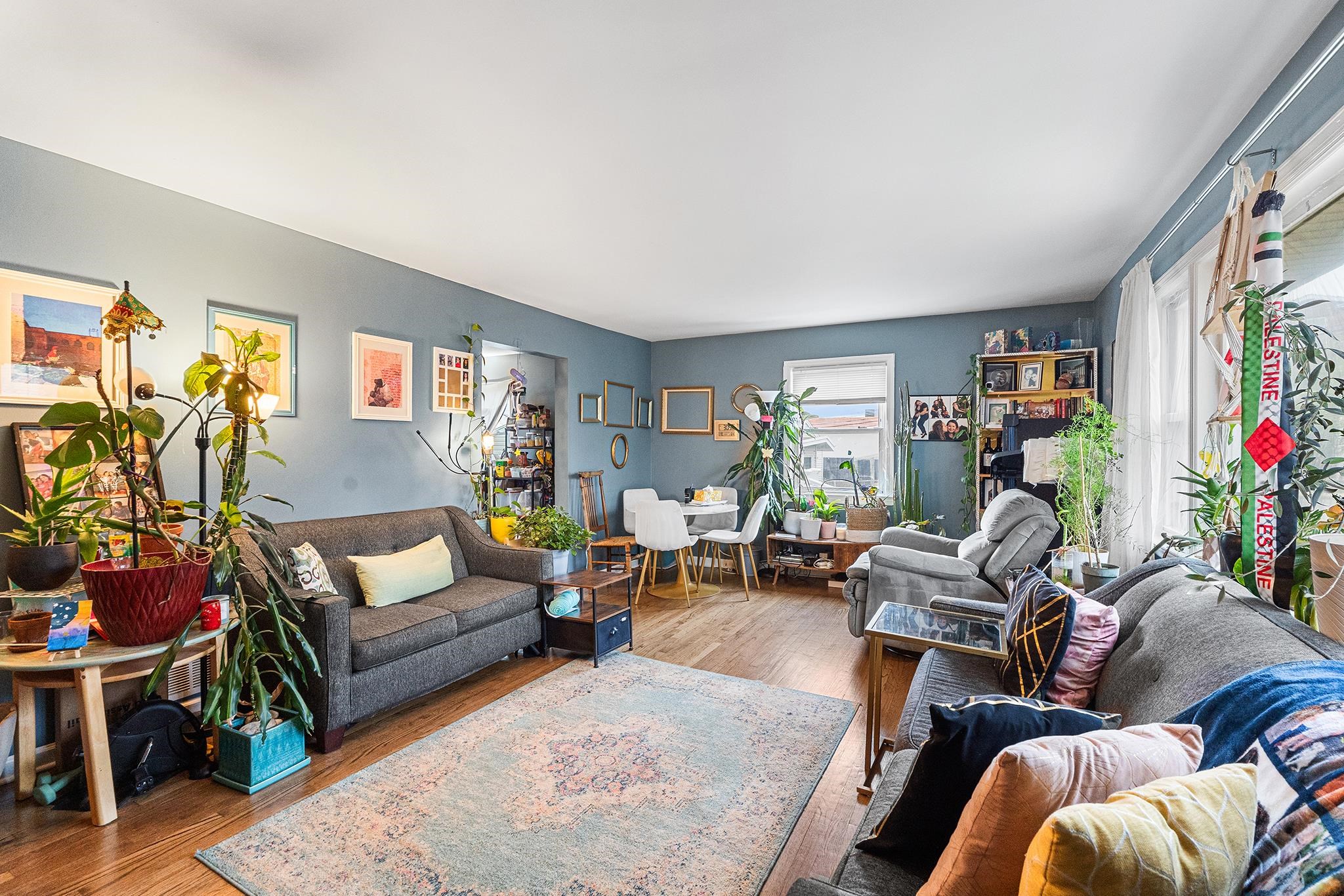 6 Mutillod Lane Secaucus, NJ 07094 - Photo 7 of 41 a living room with furniture and a potted plant