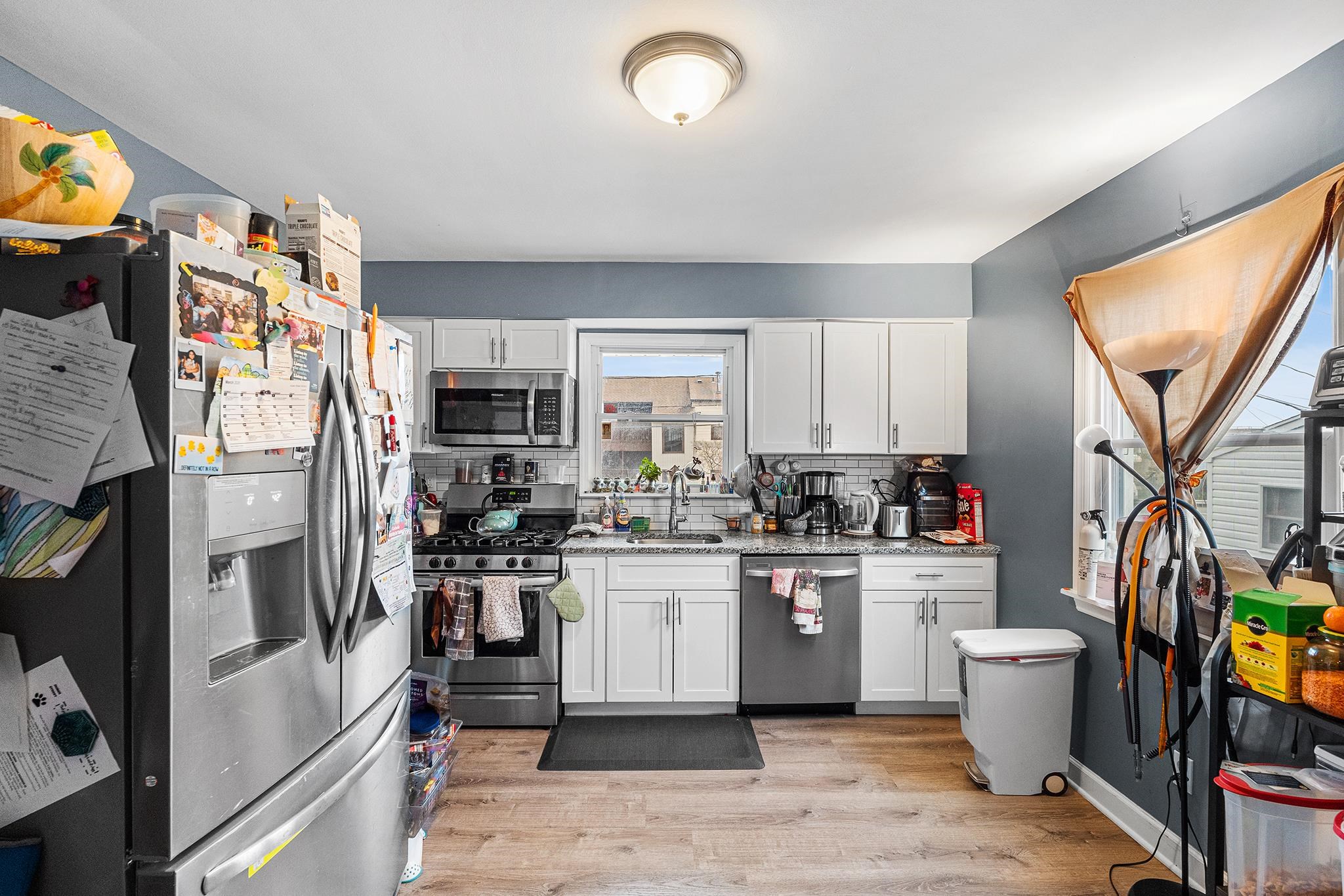 6 Mutillod Lane Secaucus, NJ 07094 - Photo 10 of 41 a kitchen with a sink stainless steel appliances and cabinets