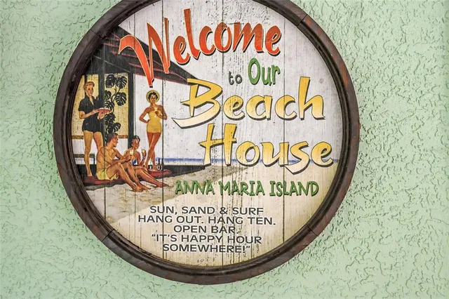 a kitchen with a stove a sink and a wooden cabinets