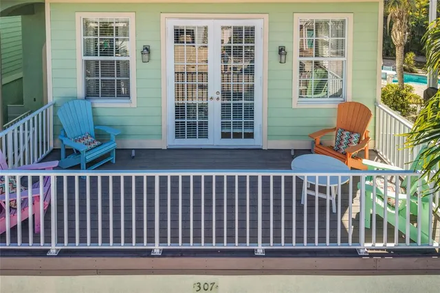 a view of a chair and a window