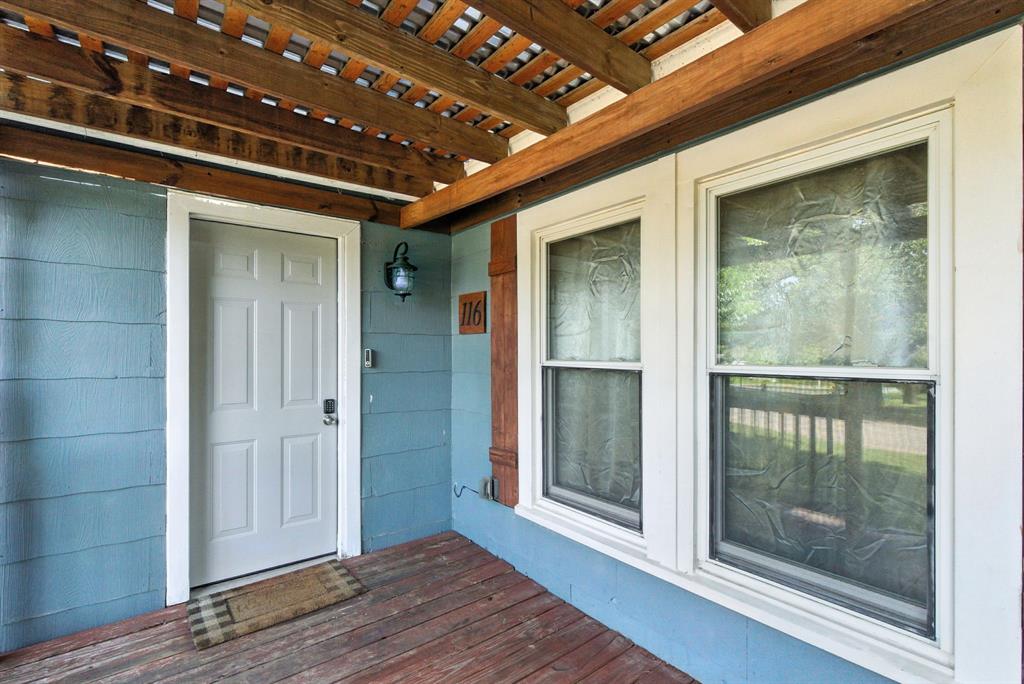 116 West 7th Street Weatherford, TX 76086 - Photo 5 of 26 a view of entryway with wooden floor