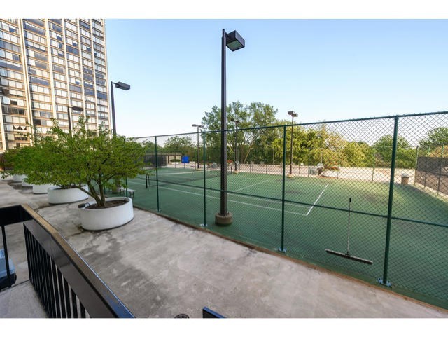 5455 North Sheridan Road, Unit 3906 Chicago, IL 60640 - Photo 23 of 24 a view of a room and floor to ceiling window