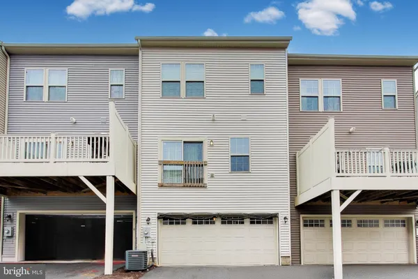 a front view of a house with a balcony