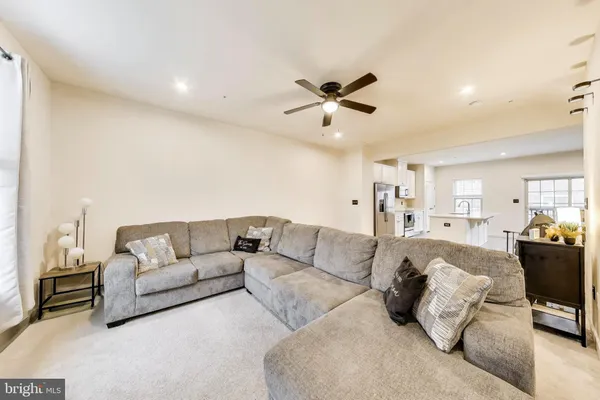 a living room with furniture and a couch