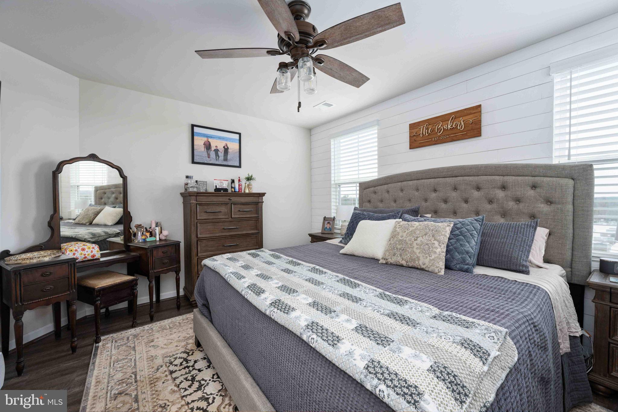 2840 Farzi Circle Locust Grove, VA 22508 - Photo 34 of 48 a bed room with a bed and a chandelier