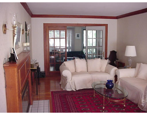 83 Standish Road Watertown, MA 02472 - Photo 3 of 4 a living room with furniture and a window