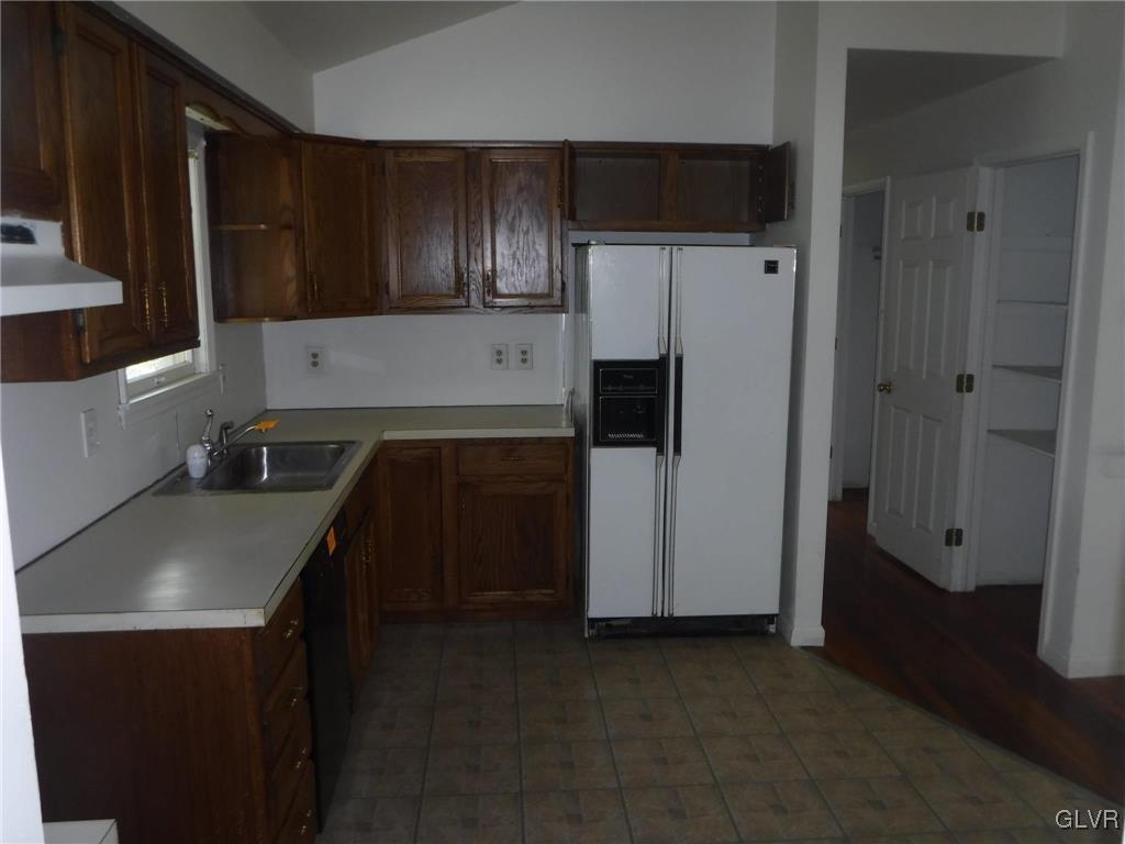 169 Hty Road Kunkletown, PA 18058 - Photo 4 of 10 a kitchen with a refrigerator and a stove