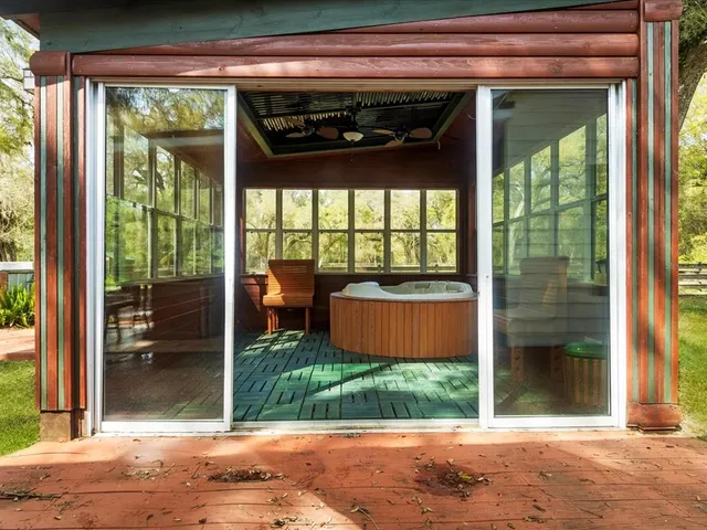 a table and chairs in a balcony