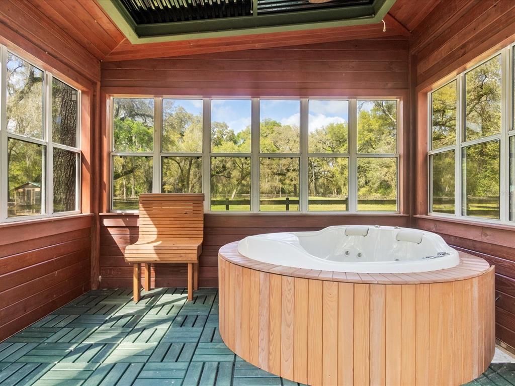 10820 Southwest 31st Way Webster, FL 33597 - Photo 16 of 37 a table and chairs in a balcony