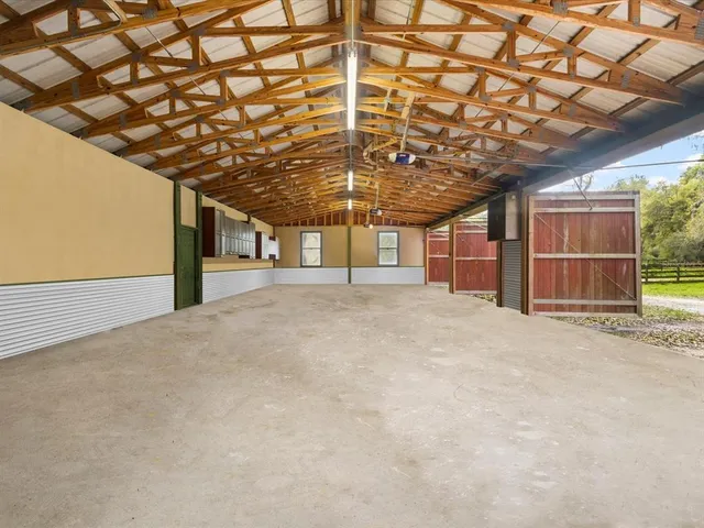 a view of a room with wooden walls
