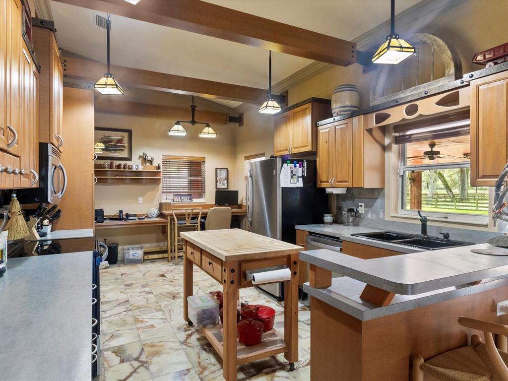 10820 Southwest 31st Way Webster, FL 33597 - Photo 24 of 37 a large kitchen with lots of counter space