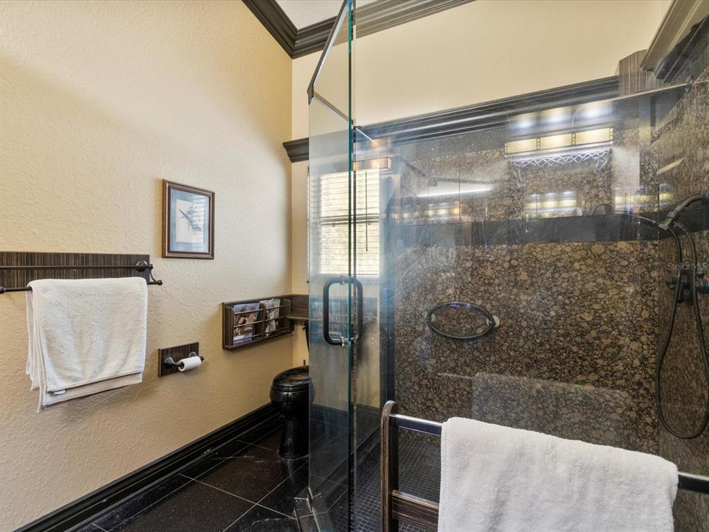 10820 Southwest 31st Way Webster, FL 33597 - Photo 27 of 37 a bathroom with a shower