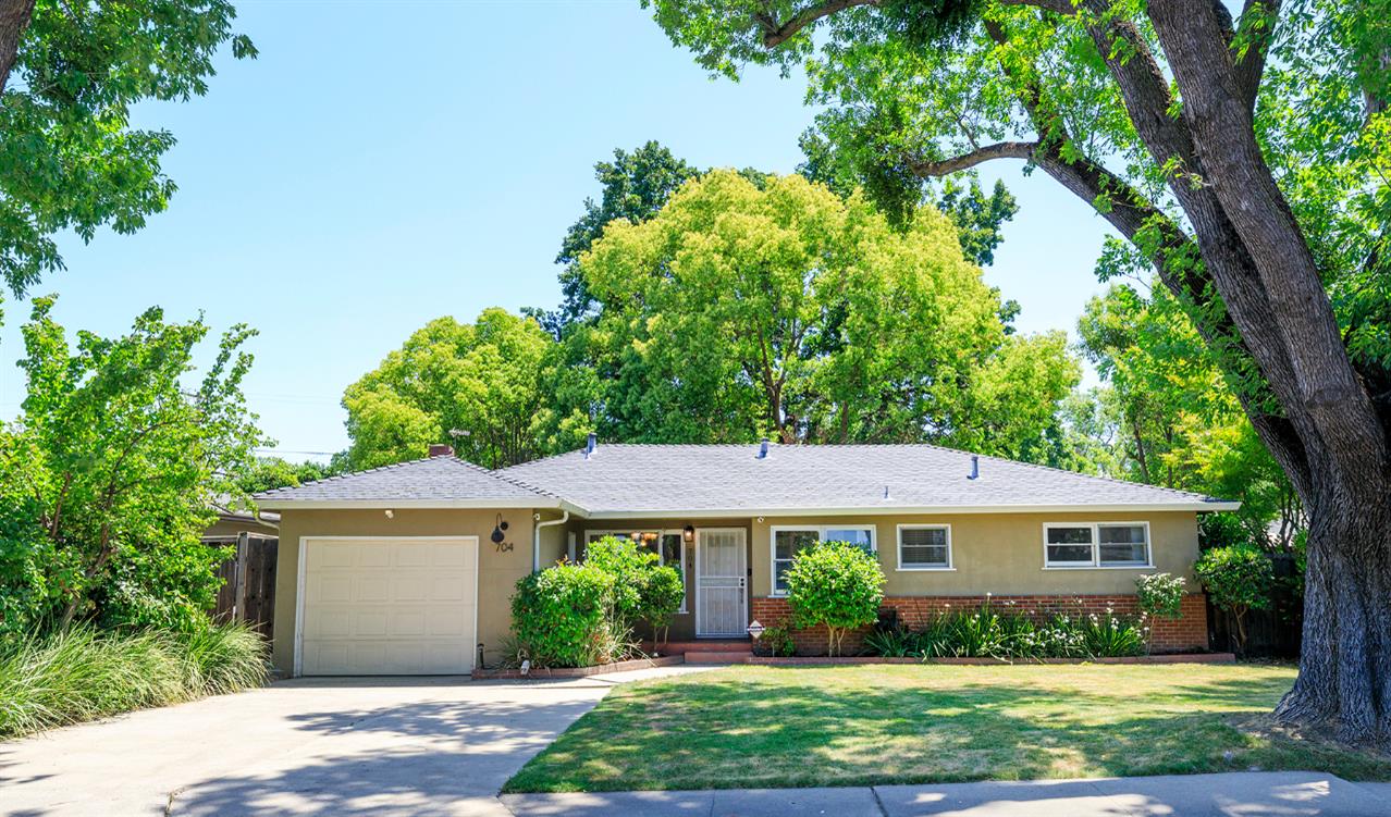 704 Edison Avenue Modesto, CA 95350 - Photo 1 of 1 a view of a house with a garden