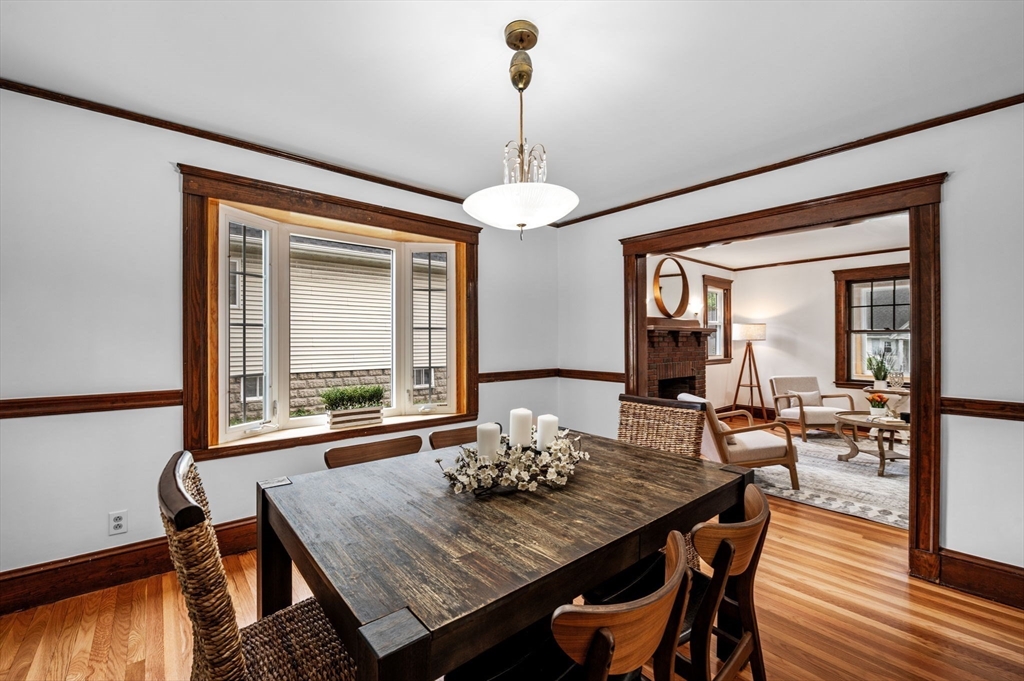 33 Intervale Avenue Saugus, MA 01906 - Photo 11 of 40 a view of a dining room with furniture window and wooden floor