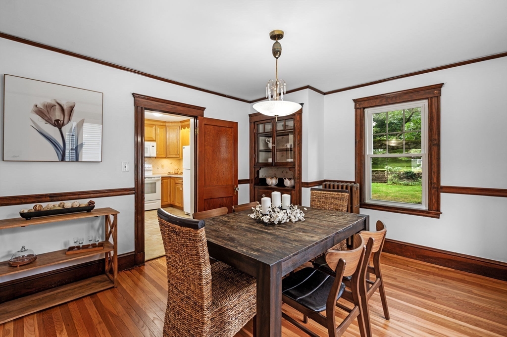 33 Intervale Avenue Saugus, MA 01906 - Photo 13 of 40 a view of a dining room with furniture window and wooden floor