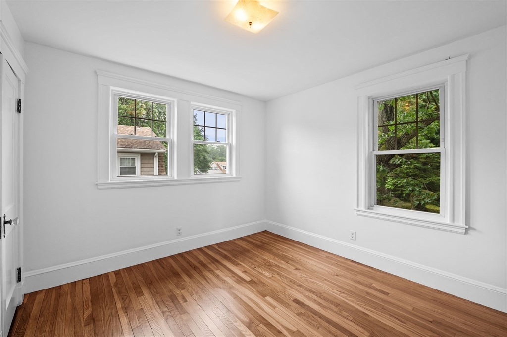 33 Intervale Avenue Saugus, MA 01906 - Photo 21 of 40 a view of empty room with wooden floor and fan